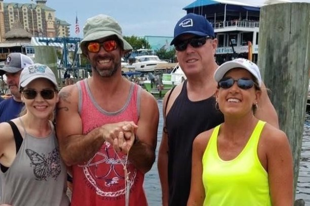 a group of people posing for the camera